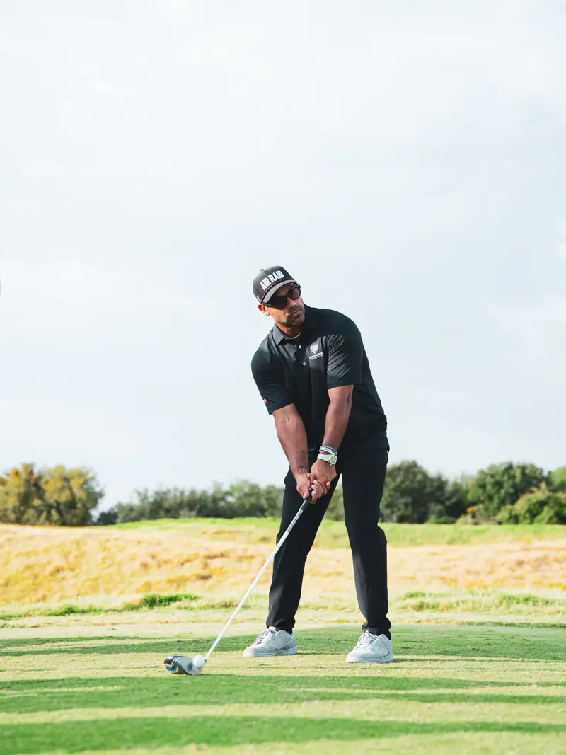 Craig LeBlanc, motivational speaker and football mentor, on a golf course in DFW